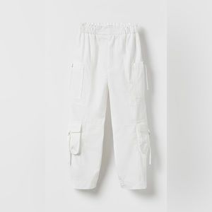 Parachute pants with elastic waistband and front closure. Size 11/12